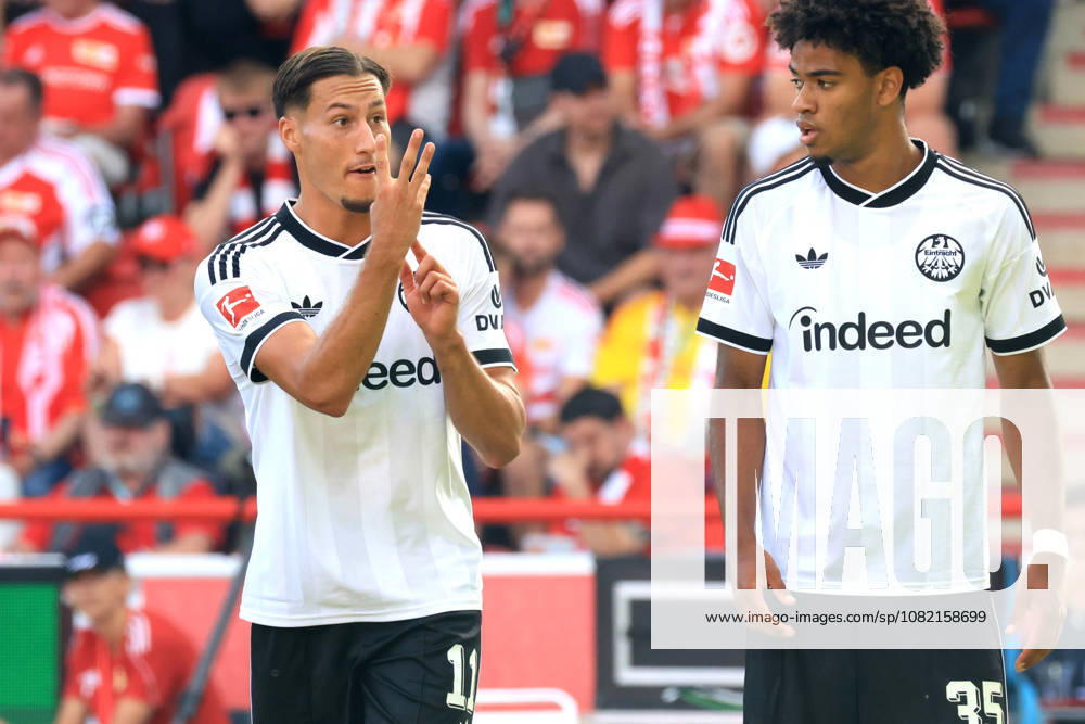 GER, Soccer, Bundesliga 1, 2026–2027, Alte Foersterei, 1. FC Union vs. Eintracht Frankfurt YOUNES EBNOUTALIB Eintracht Frankfurt 11, Malik Pimpong Eintracht Frankfurt 35, Sign Language 1st Division DFB DFL regulations prohibit any use of photographs as image sequences and or quasi-video Berlin Stadium Alte Foersterei Berlin Germany