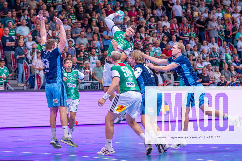 Sebastian Heymann of TSV Hannover Burgdorf, No. 11 from the left, TSV Hannover Burgdorf (green) vs. HC Hamburg (blue) on Matchday 3 of the 2026–2027 season in the Opel Handball Bundesliga, September 5, 2026, at the ZAG Arena in Hannover, Germany,