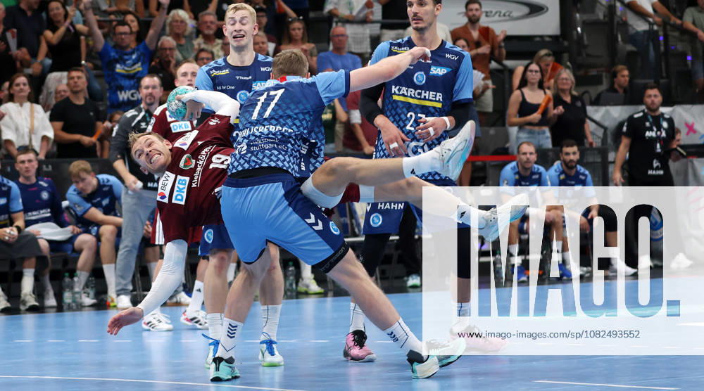 Germany, Stuttgart, Handball: TVB Stuttgart vs. Füchse Berlin; from left: Torben Matzken (TVB), Mathias Gidsel (Berlin), Samuel Röthlisberger (TVB), Philipp Meyer (Berlin)