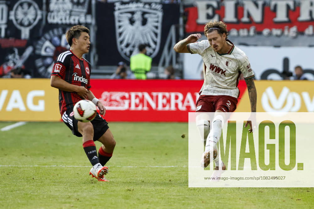 Ritsu Doan (Eintracht Frankfurt), 20, and Calvin Brackelmann (FC Augsburg), 02, battling for the ball, Germany, soccer, Bundesliga 1, Matchday 2, 2026–2027, Eintracht Frankfurt vs. FC Augsburg, September 6, 2026, Frankfurt am Main, Deutsche Bank Park, Germany