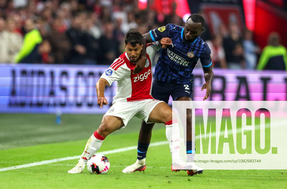AMSTERDAM: AFC Ajax Amsterdam forward Marcos Leonardo and PSV Eindhoven defender Lutsharel Geertruida during the Vriendenloterij Eredivisie match between Ajax and PSV at the Johan Cruijff ArenA on September 5, 2026, in Amsterdam, Netherlands PETER LOUS EYE4IMAGES DeFodi Images