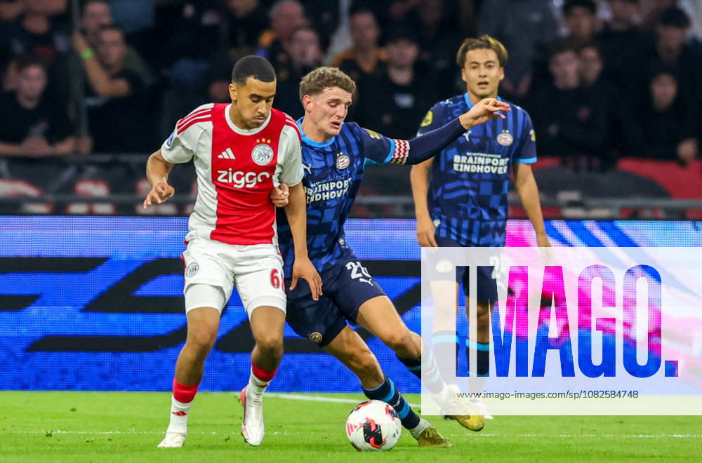 AMSTERDAM: AFC Ajax Amsterdam midfielder Abdellah Ouazane with PSV Eindhoven midfielder Guus Til during the Vriendenloterij Eredivisie match between Ajax and PSV at the Johan Cruijff ArenA on September 5, 2026, in Amsterdam, Netherlands PETER LOUS EYE4IMAGES DeFodi Images