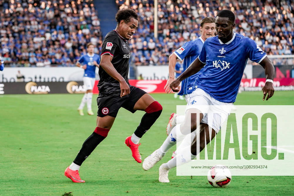 Germany Soccer Season 2026–2027, 2. Bundesliga, Matchday 5, SV Darmstadt 98 vs. Arminia Bielefeld, Merck Stadium at Böllenfalltor, Darmstadt, Henri Koudossou (Arminia Bielefeld, No. 7) in a tackle with Patric Pfeiffer (SV Darmstadt 98, No. 6), Darmstadt, Merck Stadium at Böllenfalltor, Germany