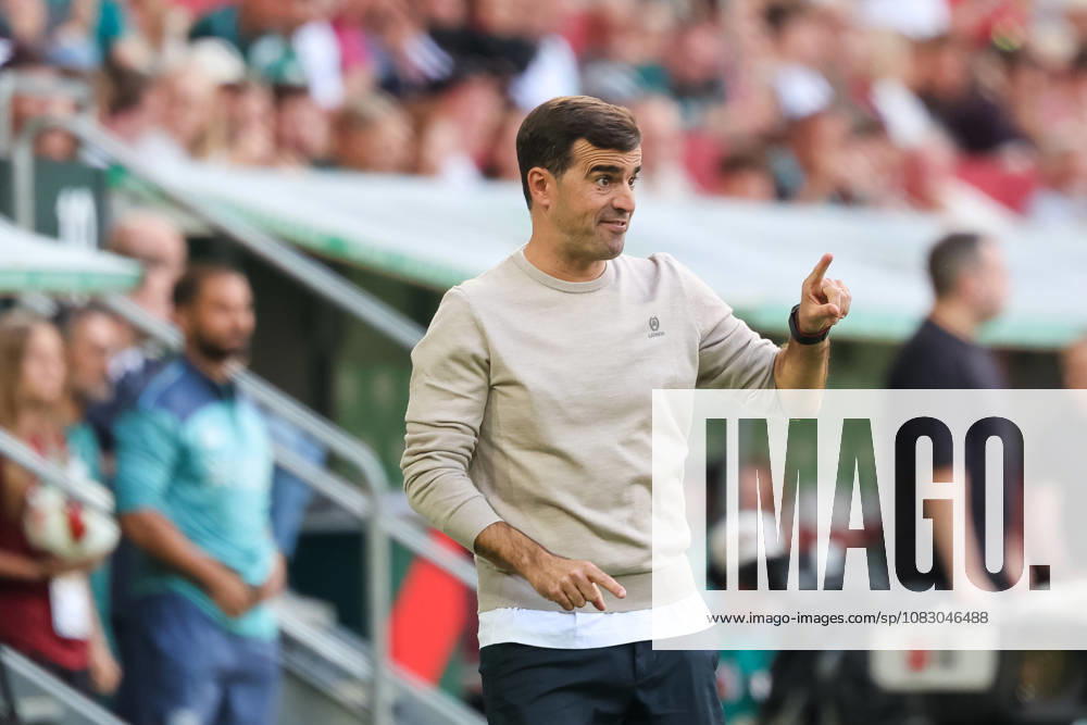 Carles Martinez, head coach of Bayer 04 Leverkusen, gesturing; gestures; GER; FC Augsburg vs. Bayer 04 Leverkusen; soccer; Bundesliga; Matchday 3; 2026–2027 season; September 12, 2026; DFL and DFB regulations prohibit any use of photographs as image sequences and or quasi-video, GER, FC Augsburg vs. Bayer 04 Leverkusen, soccer, Bundesliga, Matchday 3, 2026–2027 season, September 12, 2026, Augsburg