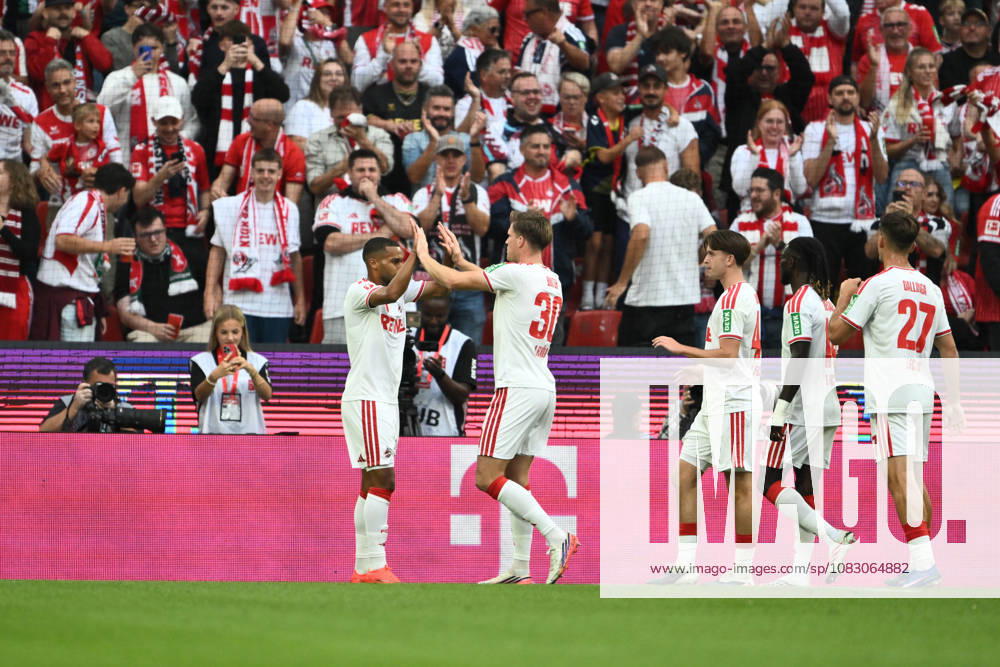 GER, Soccer, Men s, Bundesliga 1, 2026–2027 Season, Matchday 3, 1. FC Köln vs. SV Werder Bremen Linton Maina (1. FC Köln), 37, Marius Bülter (1. FC Köln), 30, Thijs Dallinga, 1 FC Köln, 27, and the team celebrate the 1–0 goal; DFB and DFL regulations prohibit any use of photographs as image sequences and or quasi-video. Köln Rhein Energie Stadium, NRW, Germany