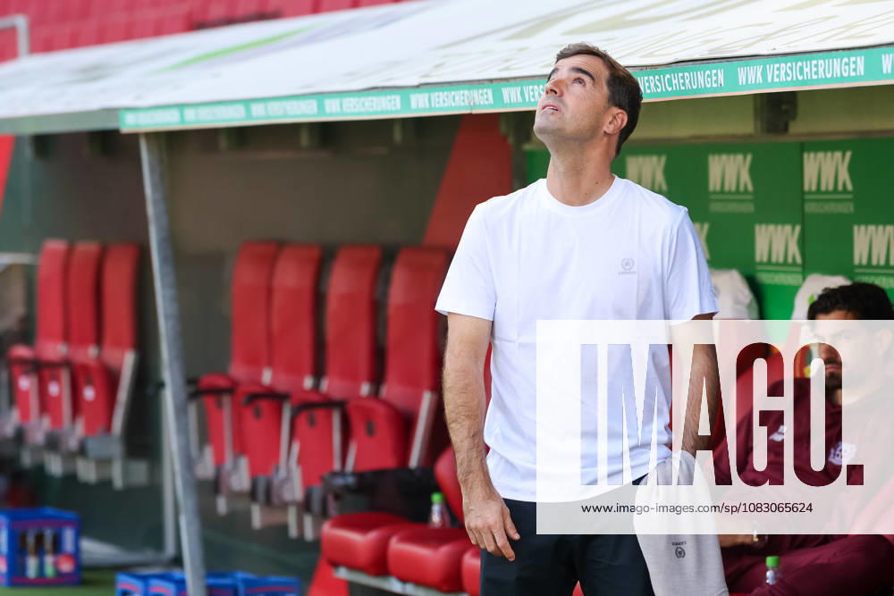 Carles Martinez, head coach of Bayer 04 Leverkusen, looks up before the game, GER, FC Augsburg vs. Bayer 04 Leverkusen, soccer, Bundesliga, Matchday 3, 2026–2027 season, September 12, 2026, DFL and DFB regulations prohibit any use of photographs as image sequences and or quasi-video, GER, FC Augsburg vs. Bayer 04 Leverkusen, soccer, Bundesliga, Matchday 3, 2026–2027 season, September 12, 2026, Augsburg
