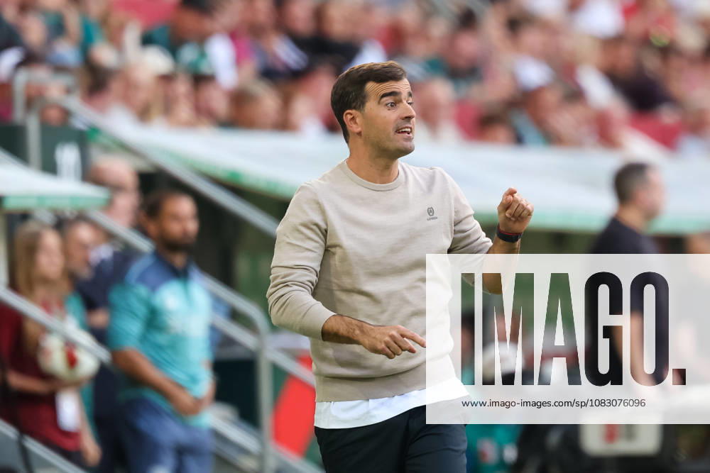 Carles Martinez, Bayer 04 Leverkusen, head coach gesturing; gestures; gesture; body language; cutout; GER; FC Augsburg vs. Bayer 04 Leverkusen; soccer; Bundesliga; Matchday 3; 2026–2027 season, September 12, 2026, DFL and DFB regulations prohibit any use of photographs as image sequences and or quasi-video, GER, FC Augsburg vs. Bayer 04 Leverkusen, soccer, Bundesliga, Matchday 3, 2026–2027 season, September 12, 2026, Augsburg