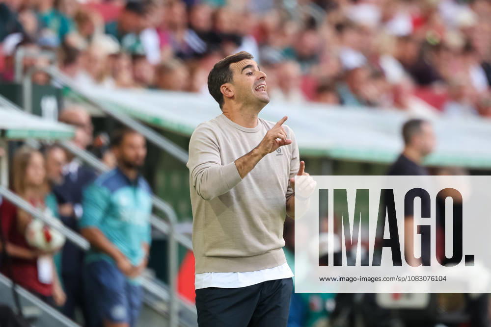 Carles Martinez, Bayer 04 Leverkusen, head coach gesturing; gestures; gesture; body language; cutout; GER; FC Augsburg vs. Bayer 04 Leverkusen; soccer; Bundesliga; Matchday 3; 2026–2027 season, September 12, 2026, DFL and DFB regulations prohibit any use of photographs as image sequences and or quasi-video, GER, FC Augsburg vs. Bayer 04 Leverkusen, soccer, Bundesliga, Matchday 3, 2026–2027 season, September 12, 2026, Augsburg