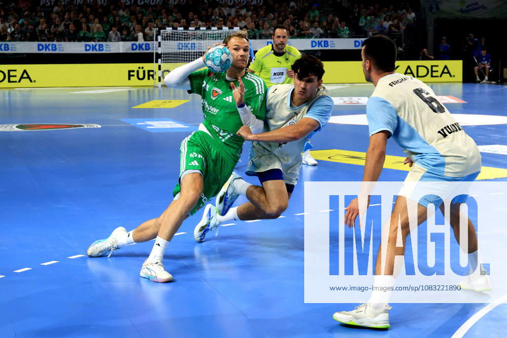 GER Germany, Handball, 1st Bundesliga, August 27, 2026, 2026–2027 season, Berlin, Fuechse Berlin vs. Gummersbach, Mathias Gidsel (Fuechse Berlin) 19, Nikola Roganovic (VfL Gummersbach) 23, Milos Vujovic (VfL Gummersbach) 6, nordphoto GmbH, Engler Berlin, Max Schmeling Hall, Berlin, Germany