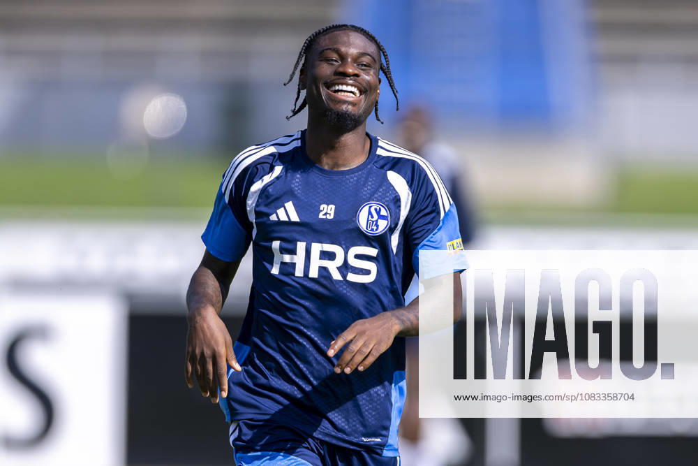 Soccer, FC Schalke 04 Junior Training Dina Ebimbe FC Schalke 04 Laughs Gelsenkirchen FC Schalke 04 Training Facility NRW Germany xRHR PHOTO YYx
