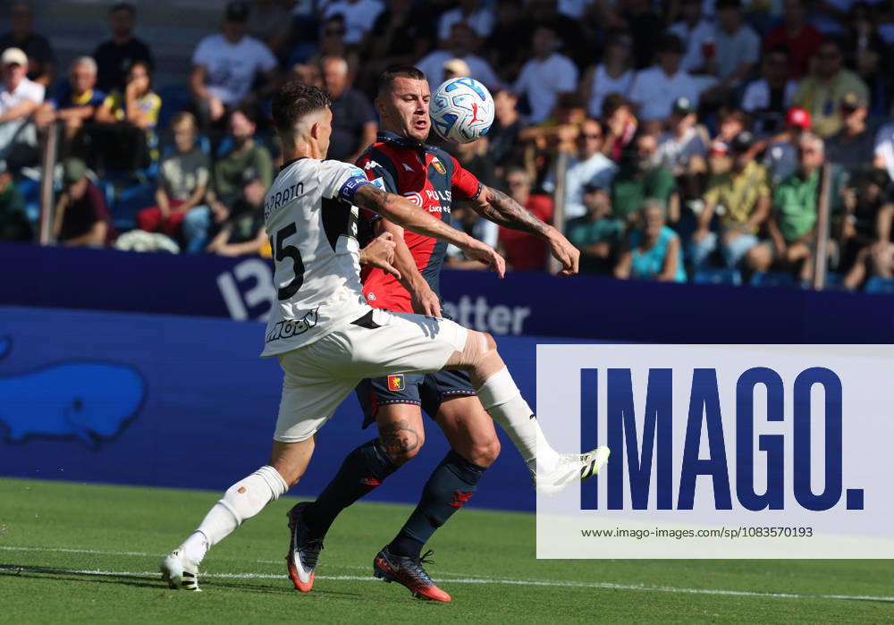 Genoas Milutin Osmajic fights for the ball with Parmas Enrico Delprato during the Serie A soccer match between Parma and Genoa at the Ennio Tardini Stadium in Parma, north west Italy - September 20, 2026. - Soccer