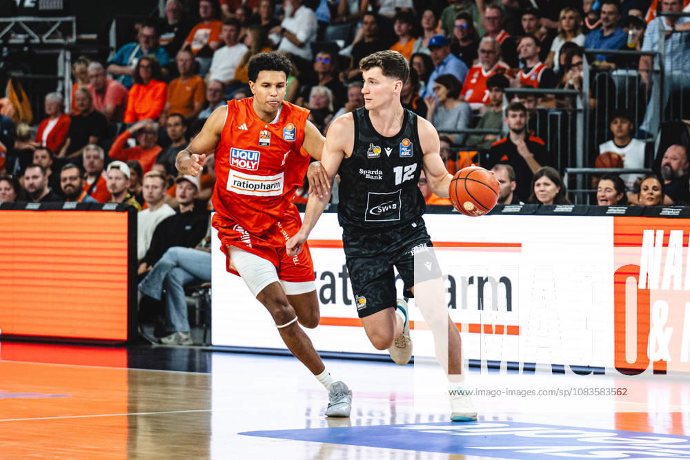Michael Rataj of ratiopharm Ulm and Patrick Cartier of MHP RIESEN Ludwigsburg go head-to-head during the Basketball Bundesliga game between ratiopharm Ulm and MHP RIESEN Ludwigsburg at the ratiopharm Arena on September 20, 2026 in Neu Ulm, Germany. Photo by Harry Langer, DeFodi Images, ratiopharm Arena, Germany, September 20, 2026: Michael Rataj of ratiopharm Ulm and Patrick Cartier of MHP RIESEN Ludwigsburg battle for the ball during the Basketball Bundesliga match between ratiopharm Ulm and MHP RIESEN Ludwigsburg in Neu Ulm on September 20, 2026 at the ratiopharm Arena, Germany Photo by Harry Langer, DeFodi Images Photo by Harry Langer, DeFodi Images