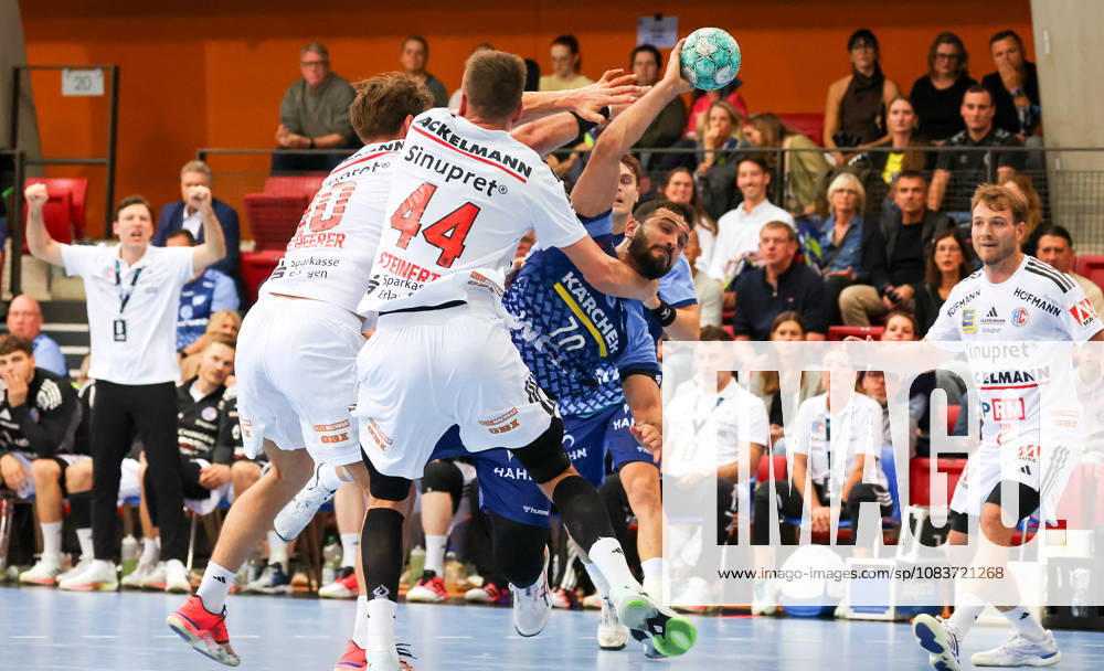 Germany, Stuttgart, DHB Cup 2026–2027 Season, TVB Stuttgart vs. HC Erlangen, from left: Florian Scheerer (HCE), Christoph Steinert (HCE), Diaro Sanz De Nicolas (TVB)