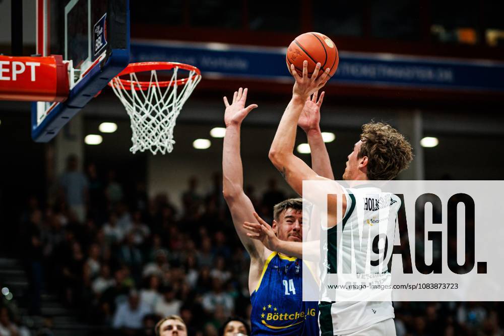 Marco Hollersbacher of the Gladiators Trier goes head-to-head with Tanner Stuckman of Science City Jena; Action: Vet Concept Gladiators Trier vs. Science City Jena, Basketball, easyCredit BBL, Matchday 2, 2026–2027 Season, September 27, 2026, Vet Concept Gladiators Trier vs. Science City Jena, basketball, easyCredit BBL, Matchday 2, 2026–2027 season