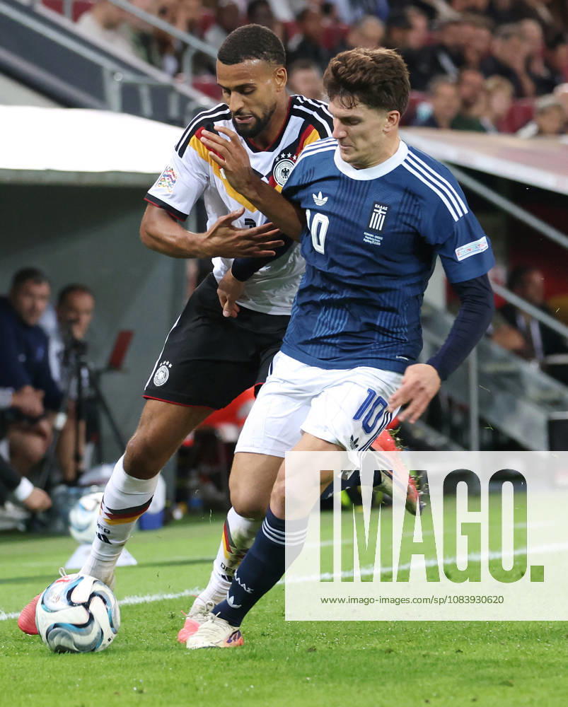 Germany, Augsburg: International soccer match between Germany and Greece; from left: Josha Vagnoman (GER) and Christos Tzolis (Greece)