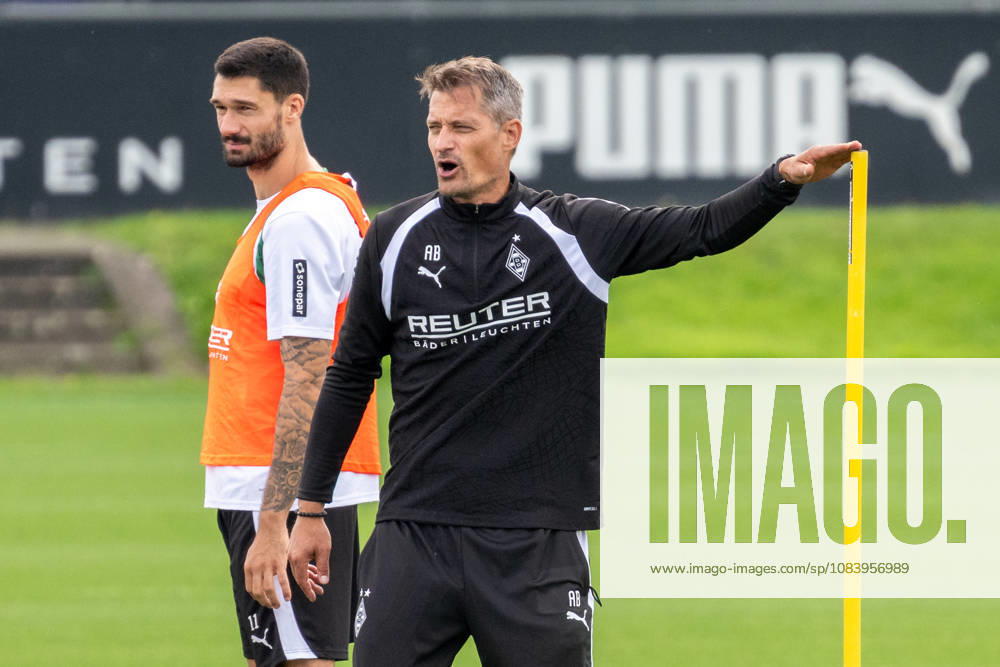 Alexander Blessin of Borussia Mönchengladbach, coach, explains the drill. Next to him is Tim Kleindienst of Borussia Mönchengladbach. 11th Public Training Session, Borussia Mönchengladbach, Soccer, Bundesliga, 2026–2027 Season, September 29, 2026, Borussia Mönchengladbach open training session, soccer, Bundesliga, 2026–2027 season, September 29, 2026, Mönchengladbach