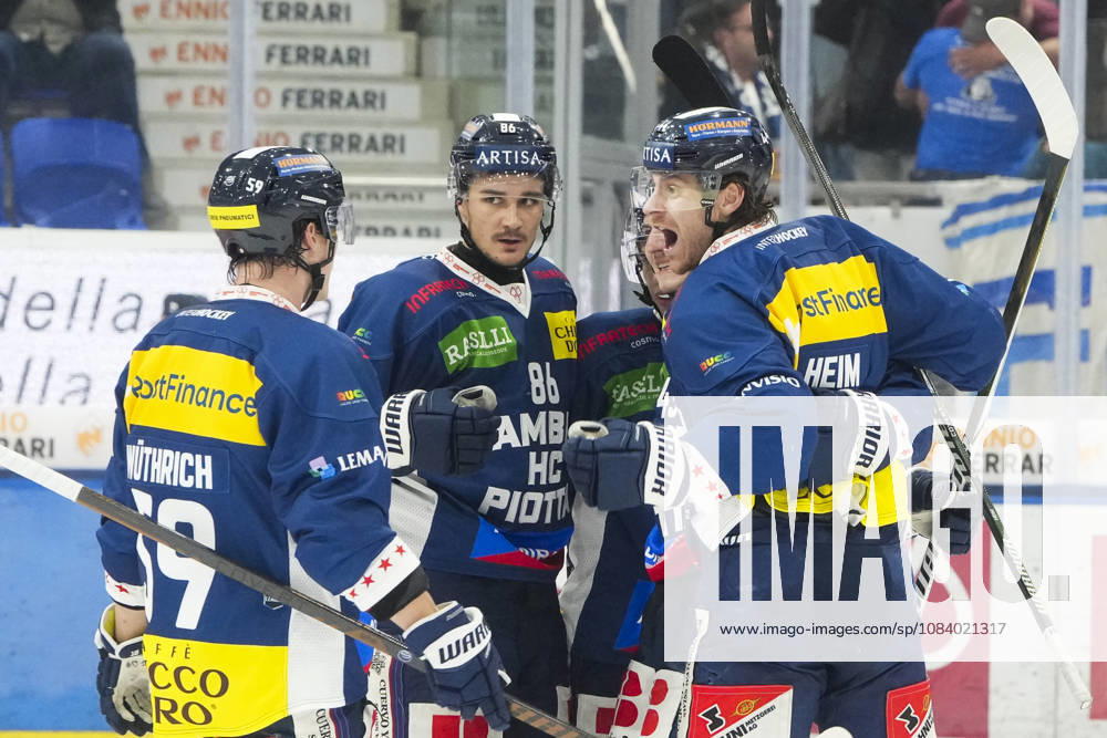Quinto, Gottardo Arena, NL HC Ambri Piotta vs. SCL Tigers: 44 Andre Heim (Ambri, R), 59 Dario Wuthrich (Ambri, L), and 86 Rocco Pezzullo (Ambri, 2nd L) celebrate Tim Muggli’s goal for Ambri at the Gottardo Arena in Quinto, Ticino, Switzerland