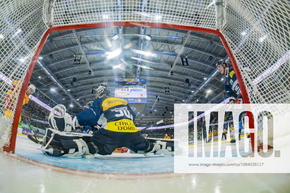 Quinto, Gottardo Arena, NL: HC Ambri-Piotta vs. SCL Tigers 30; goalkeeper Philip Wuthrich (Ambri) in action against Jerome Bachofner (Tigers) in Quinto at the Gottardo Arena in Ticino, Switzerland