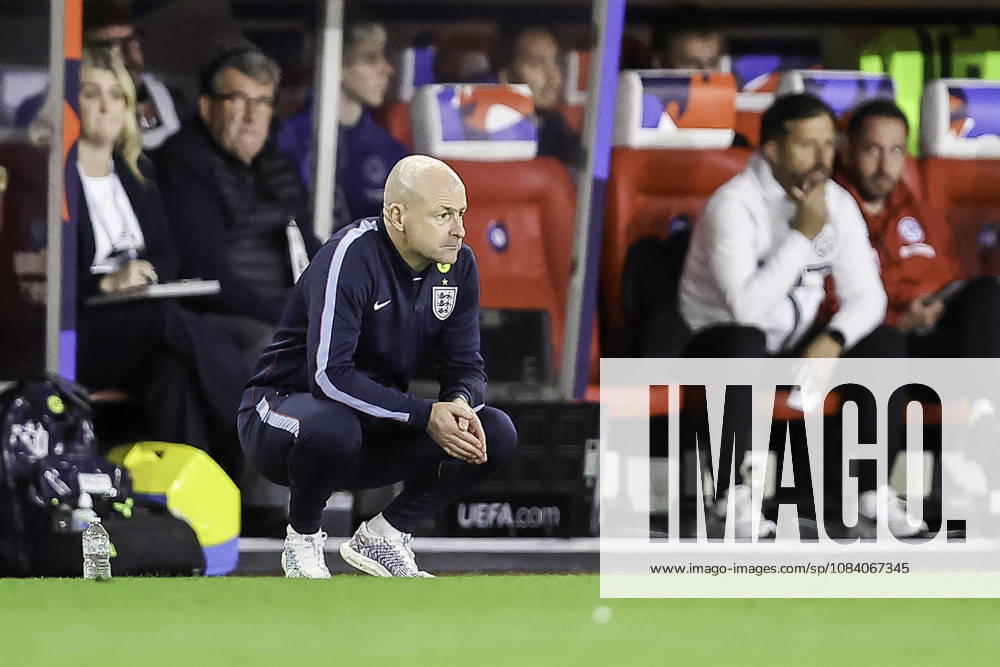 England v Slovakia - UEFA U21, U 21 EURO 2027 Qualifier Lee Carsley, manager of England U21s, watches the early action from a crouched position during the UEFA Under 21 Championship Qualifiers Group D match between England Under 21s and Slovakia at the bet365 Stadium in Stoke-on-Trent, on October 2, 2026. Stoke-on-Trent Staffordshire United Kingdom