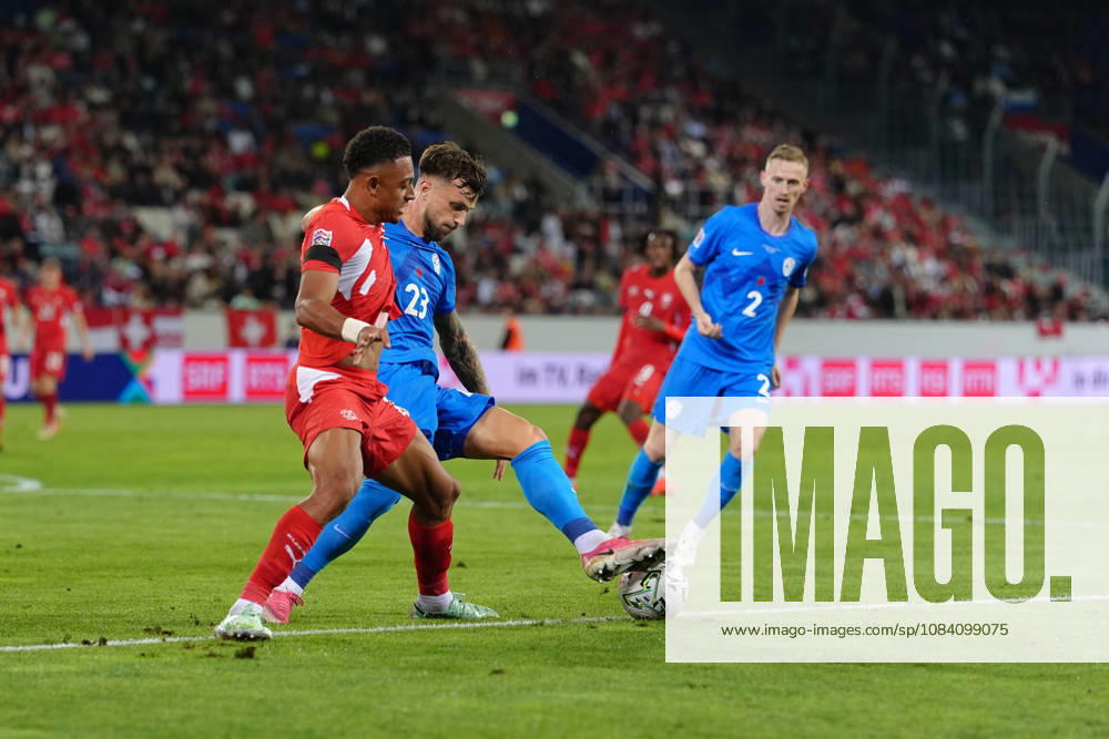 Dan Ndoye (11 SUI) against David Brekalo (23 SLO) during the UEFA Nations League match between Switzerland and Slovenia at thermoplan arena on October 03, 2026 in Luzern, Switzerland.