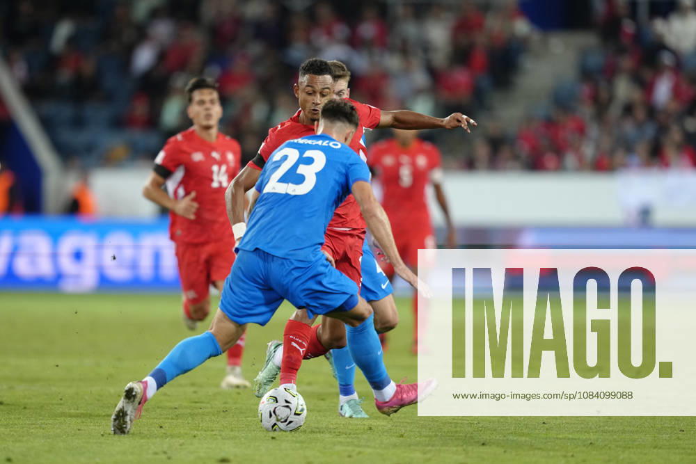 Dan Ndoye (11 SUI) against David Brekalo (23 SLO) during the UEFA Nations League match between Switzerland and Slovenia at thermoplan arena on October 03, 2026 in Luzern, Switzerland.