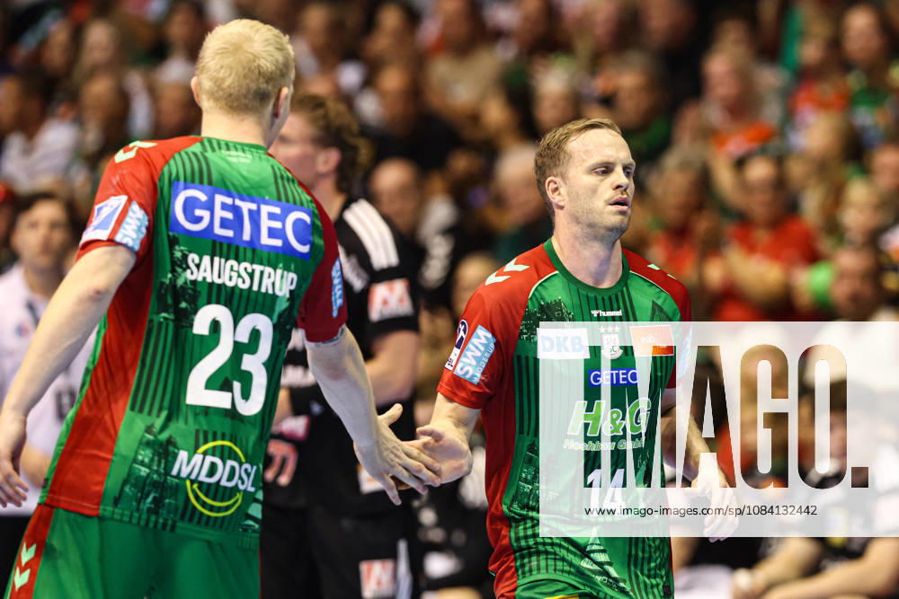 Omar Ingi Magnusson (SC Magdeburg, 14) and Magnus Saugstrup (SC Magdeburg, 23) – Handball Bundesliga 2026–2027 season: SC Magdeburg vs. HC Erlangen at the GETEC Arena in Magdeburg. Action, handball,Germany