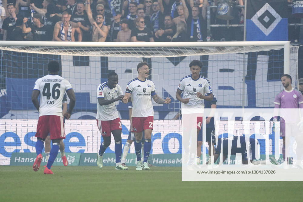 Photo: HSV players celebrate a goal after Nicolai REMBERG s 2-0 strike; Kofi AMOAKO and Bilal YALCINKAYA congratulate him. Bundesliga, friendly match on Sunday, October 4, 2026: Hamburger SV vs. FC Copenhagen