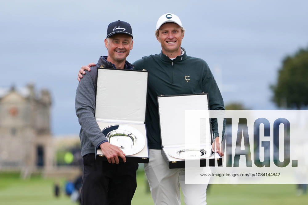 4th October 2026; Old Course at St Andrews, St Andrews, Scotland; DP World Tour Golf, Alfred Dunhill Links Championship, Final Day; Tom Chaplin and Adrian Meronk hold the team championship trophy on the Swilcan Bridge AlecxBrown