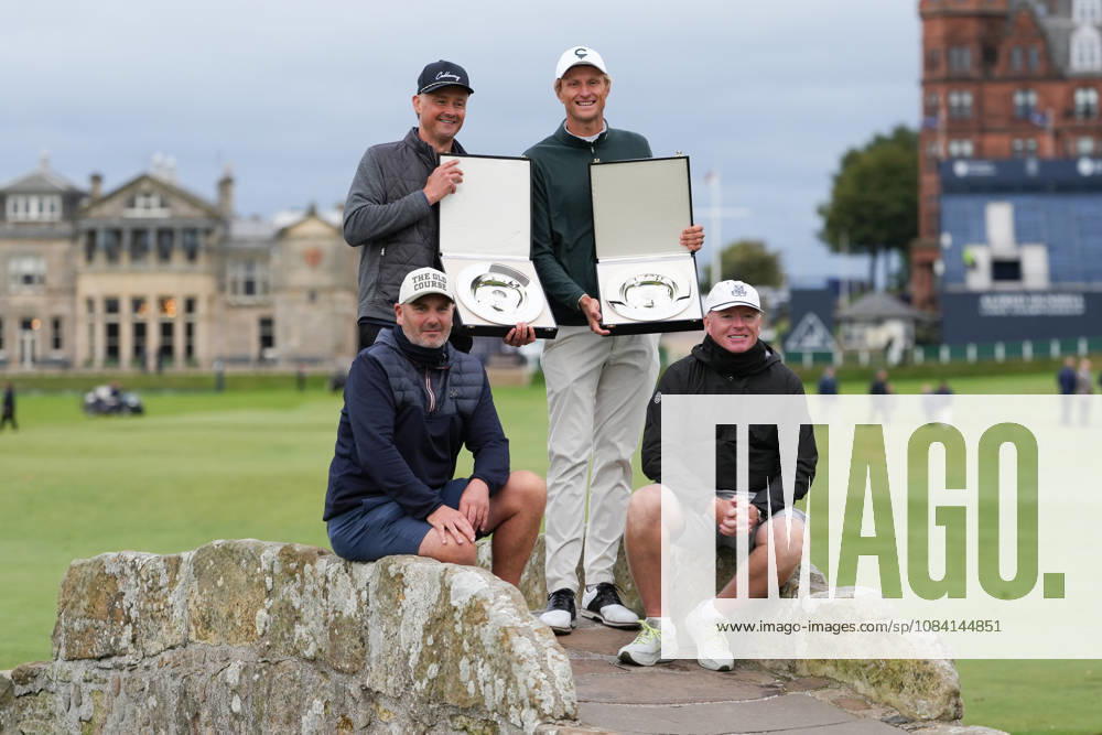 4th October 2026; Old Course at St Andrews, St Andrews, Scotland; DP World Tour Golf, Alfred Dunhill Links Championship, Final Day; Tom Chaplin, Adrian Meronk and their caddies hold the team championship trophy on the Swilcan Bridge AlecxBrown