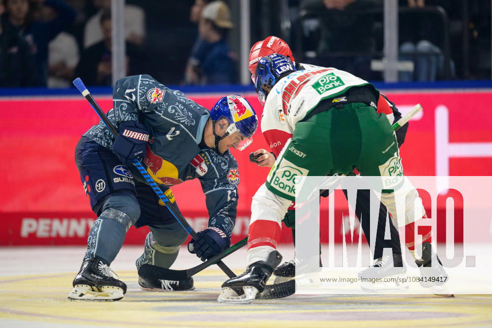 Ice Hockey, DEL, 20261004, EHC Red Bull Munich vs. Augsburg Panthers. Pictured, from left: Brady Ferguson (Munich, 12) and Tim Wohlgemuth (Augsburg, 33). Munich, SAP Garden, Bavaria, Germany