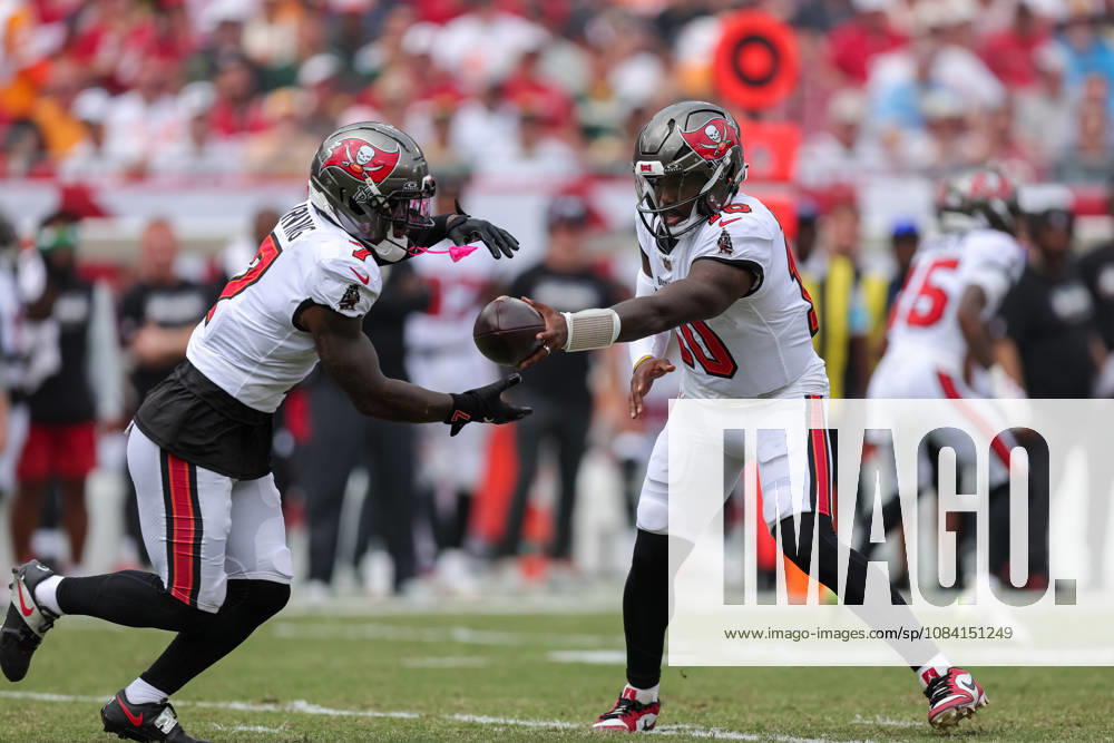 Oct 4, 2026; Tampa, FL, USA; Tampa Bay Buccaneers quarterback Jalon Daniels (10) hands the ball off to running back Bucky Irving (7) first his first NFL, American Football Herren, USA play during a game between the Green Bay Packers and Tampa Bay Buccaneers at Raymond James Stadium. Mandatory Credit: Taylor McFee-Cal Media Tampa USA - ZUMAc04_ 20261004_zma_c04_036