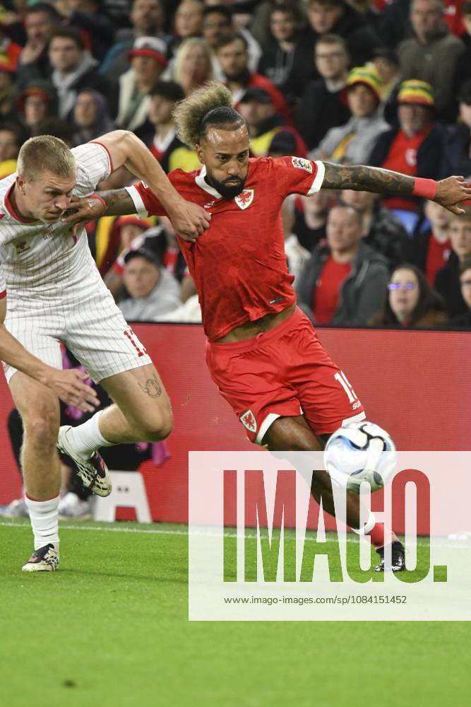 Football - 2026 2027 UEFA Nations League - League A, Group Four: Wales vs. Denmark - Cardiff City Stadium - Sunday 4th October 2026 Sorba Thomas WALES bursts down the wing challenged by Adam Daghim DENMARK colorsport winston bynorth