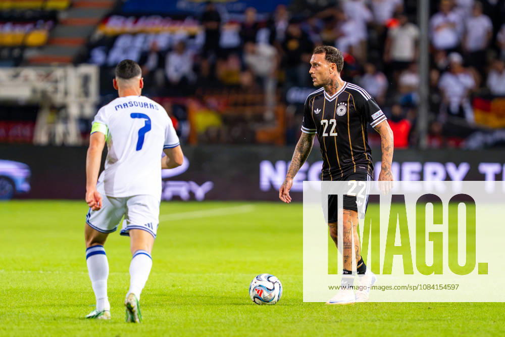 David Raum, Germany, age 22, and Georgios Masouras, Greece, age 07; Greece vs. Germany, soccer, UEFA Nations League, Matchday 4, 2026–2027 season, October 4, 2026 Greece vs. Germany, Soccer, UEFA Nations League, Matchday 4, 2026–2027 Season, October 4, 2026 Thessaloniki