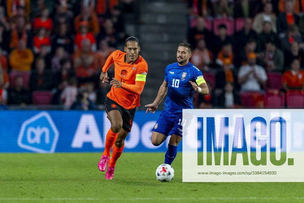EINDHOVEN Netherlands defender Virgil van Dijk and Serbia forward Dusan Tadic during the UEFA Nations League match between the Netherlands and Serbia at Philips Stadion on October 4, 2026, in Eindhoven, Netherlands. Photo by DeFodi Images
