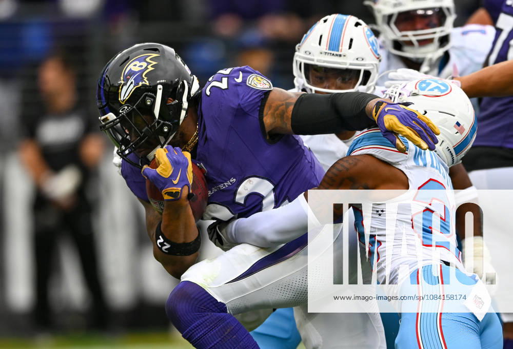 Baltimore Ravens running back Derrick Henry (22) runs for short yardage against Tennessee Titans safety Kevin Winston Jr. (23) during the first quarter at M&T Bank Stadium in Baltimore, Maryland, on Sunday, October 4, 2026. BAL20261004133 DAVIDxTULIS