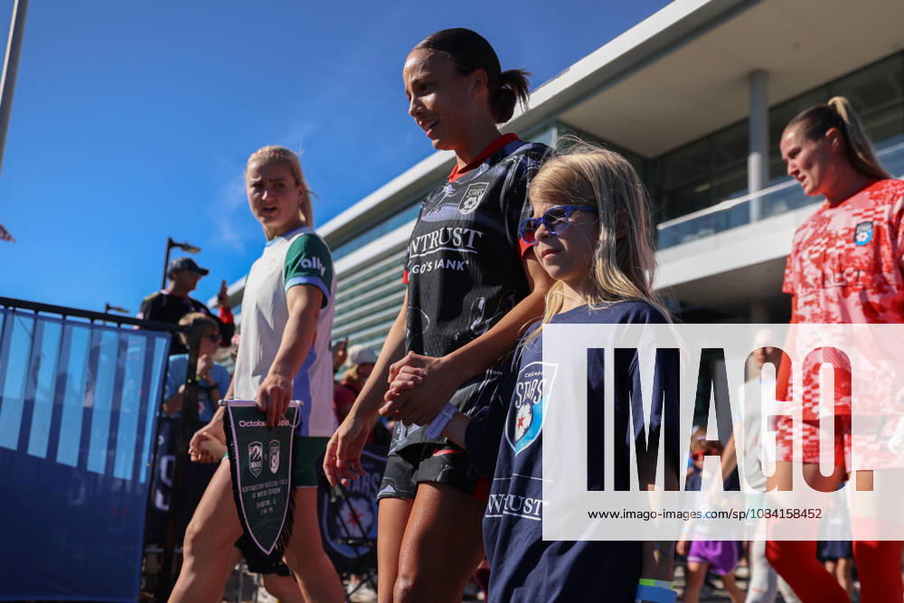 Lindsey Heaps (10 Denver Summit FC) and Mallory Swanson (9 Chicago Stars FC) walk onto the pitch before the game between the Chicago Stars FC and Denver Summit FC at Northwestern Medicine Field at Martin Stadium on Sunday, October 4 in Evanston, USA