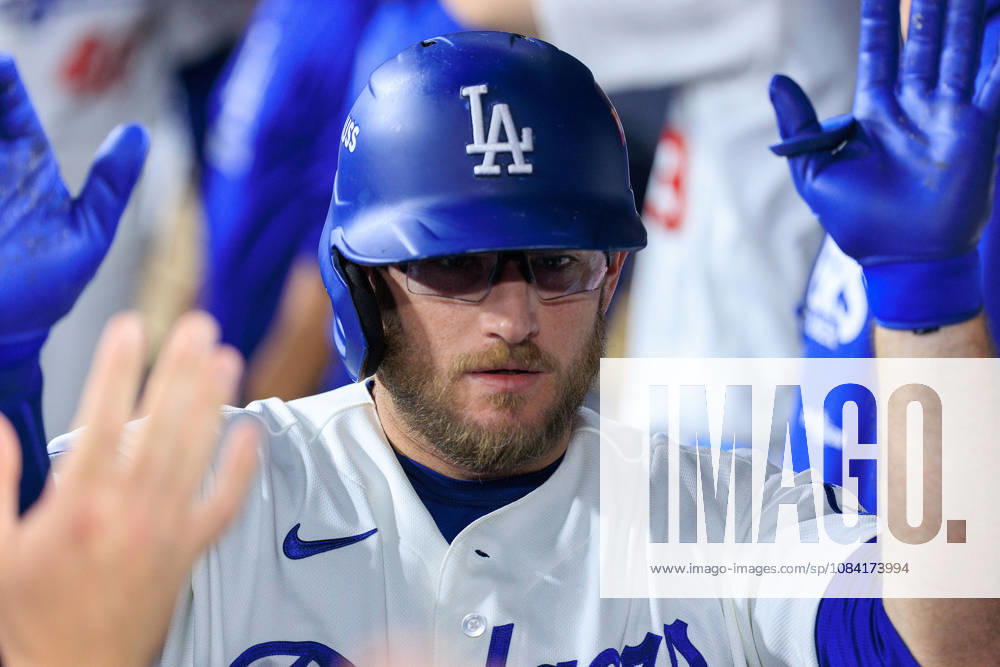 Max Muncy 13 of the Los Angeles Dodgers is congratulated in the dugout after hitting a solo home urn in the 9th inning during NLDS Game 2 against the Atlanta Braves on Sunday October 4, 2026 at Dodger Stadium in Los Angeles, California. Dodgers lose to Braves, 2-3. JAVIER ROJAS PI Dodgers Vs. Braves NLDS - Game 2 - ZUMAp124 20261004_zaa_p124_031