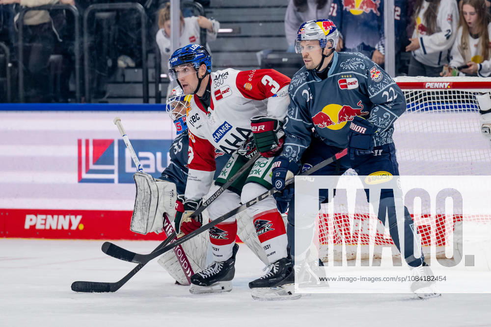Ville Pokka, EHC Red Bull Munich (No. 22), defends against Alec McCrea of the Augsburger Panther (No. 03) in front of the net of Mathias Niederberger, goaltender for EHC Red Bull Munich (No. 35), GER, EHC Red Bull Munich vs. Augsburger Panther, DEL, 2026–2027 season, Matchday 6, October 4, 2026. Photo by HMB Media, Heike Feiner