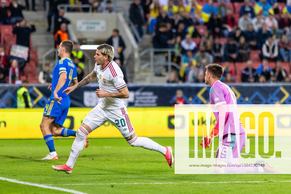 Milan Toth of Hungary and Vasas and Anatoliy Trubin of Ukraine and SL Benfica during UEFA Nations League League phase game between Ukraine vs Hungary (Dominika Kortvelyesiova Ball Raw Images) Trnava Antona Malatinskeho Stadium Slovakia