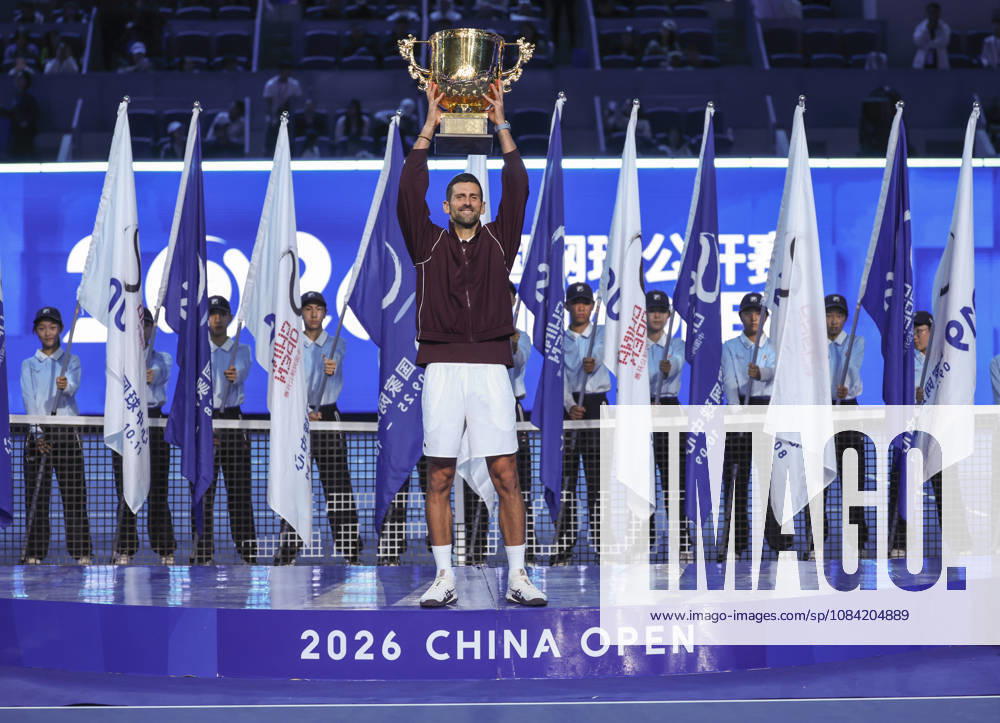 (261006) -- BEIJING, Oct. 6, 2026 -- Novak Djokovic of Serbia holds up the champion trophy during the awarding ceremony for the men s singles final at 2026 China Open tennis tournament in Beijing, China, Oct. 6, 2026. ) (SP)CHINA-BEIJING-TENNIS-CHINA OPEN-MEN S SINGLES-AWARDING CEREMONY(CN) BaixXuefei