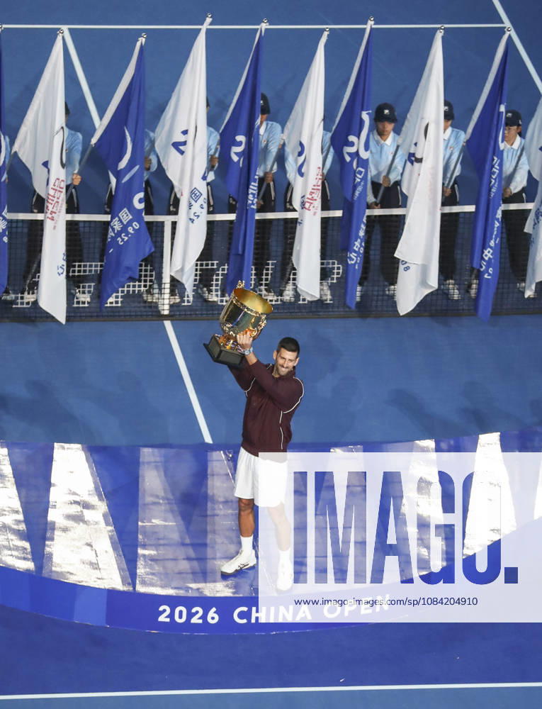 (261006) -- BEIJING, Oct. 6, 2026 -- Novak Djokovic of Serbia holds up the champion trophy during the awarding ceremony for the men s singles final at 2026 China Open tennis tournament in Beijing, China, Oct. 6, 2026. (Photo by Xinhua) (SP)CHINA-BEIJING-TENNIS-CHINA OPEN-MEN S SINGLES-AWARDING CEREMONY(CN) MaxZihan