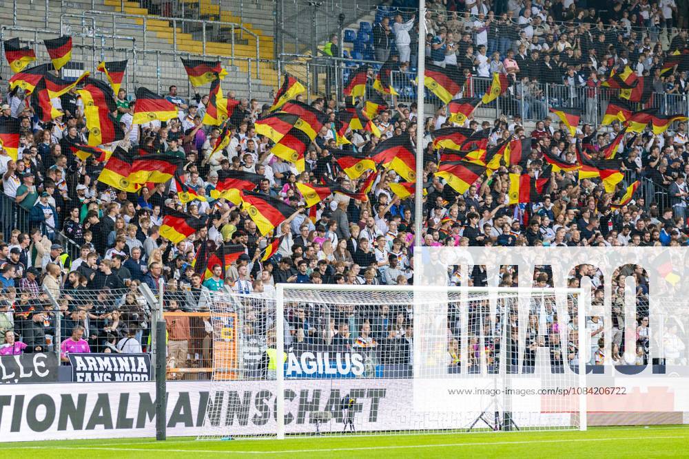 Fans of Germany s U21 team wave German flags (GER); Germany (GER) vs. Georgia (GEO), soccer, UEFA U21 European Championship Qualifiers, Group F, Matchday 13, 2026–2027 season, October 6, 2026 GER, Germany GER vs. Georgia GEO, soccer, UEFA U21 European Championship Qualifiers, Group F, Matchday 13, 2026–2027 season, October 6, 2026, Bielefeld