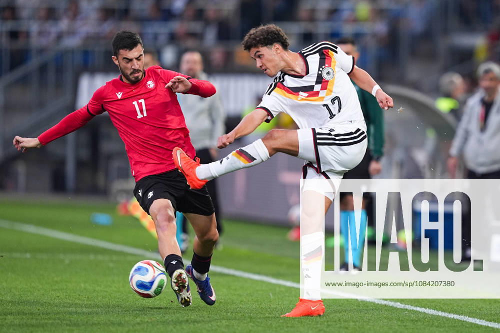 Men s, Soccer, International Match, U21, European Championship Qualifiers, Germany vs. Georgia, 2026–2027 Season, Schüco Arena Akaki Giunashvili, GEO, No. 17 in a tackle against Noah Darvich, GER, No. 17. DFB regulations prohibit any use of photographs as image sequences and or quasi-video.