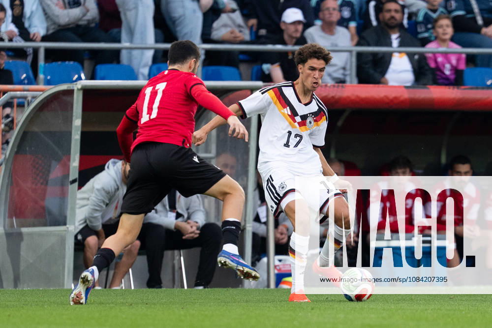 GER, Germany U21 vs. Georgia U21: A duel between Noah Darvich (Germany U21, No. 17) and Nikoloz Chikovani (Georgia U21, No. 11) at the SchücoArena in Bielefeld, Germany
