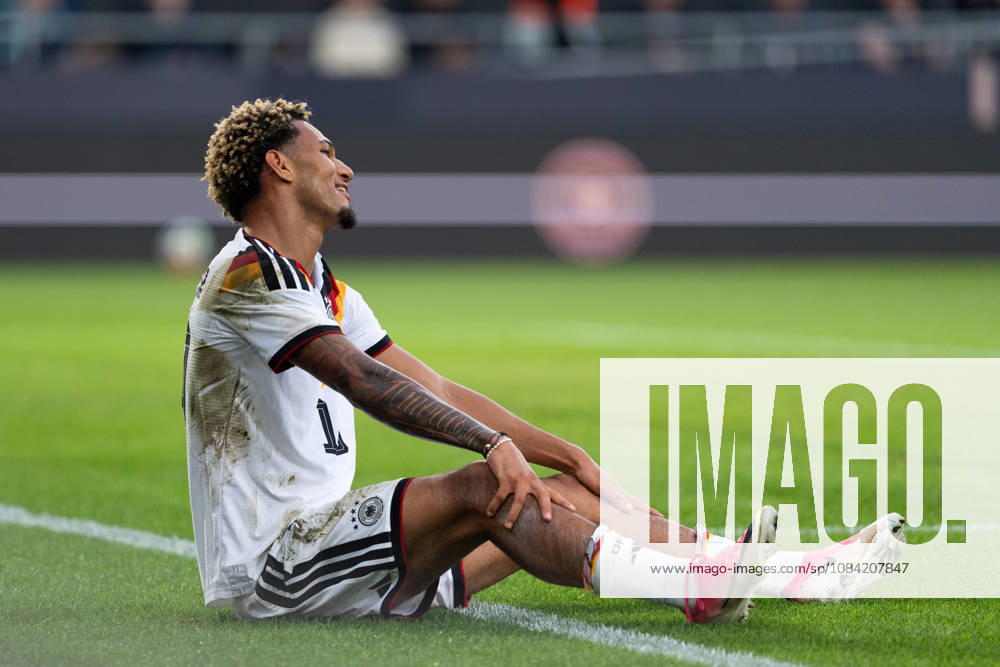 GER, Germany U21 vs. Georgia U21 Paris Brunner, Germany U21, No. 19, is sitting on the ground, complaining, and asking for a penalty kick Bielefeld SchücoArena, Bielefeld, Germany