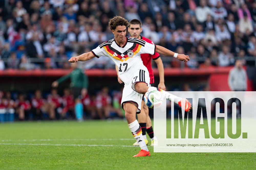 GER, Germany U21 vs. Georgia U21 Noah Darvich, Germany U21, age 17, takes a shot on goal, solo play, full-body, ball at his feet, Bielefeld, SchücoArena, Bielefeld, Germany