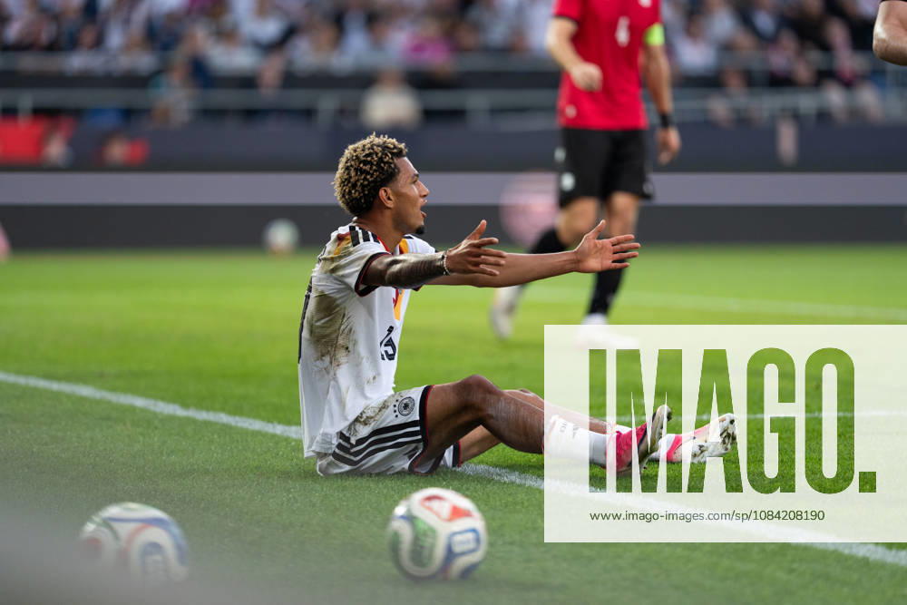 GER, Germany U21 vs. Georgia U21 Paris Brunner, Germany U21, No. 19, is sitting on the ground, complaining, and asking for a penalty kick Bielefeld SchücoArena, Bielefeld, Germany