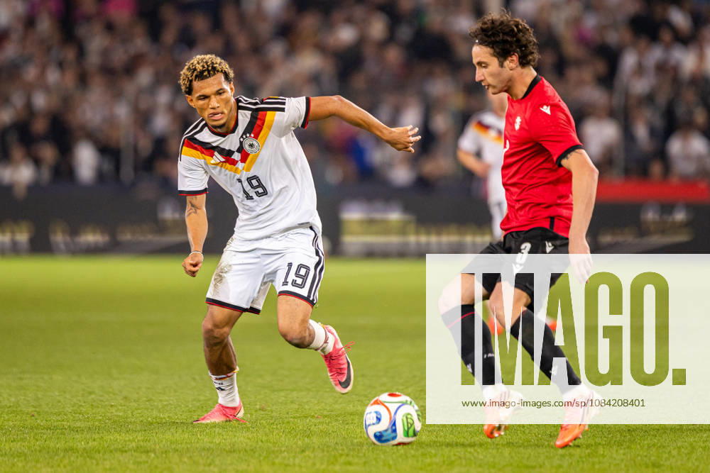 L R Paris Brunner, Germany U21, 19, in a tackle with Dato Bukia, Georgia U21, 03 GER, Germany GER vs. Georgia GEO, Soccer, UEFA U21 European Championship Qualifiers, Group F, Matchday 13, 2026–2027 season, October 6, 2026 GER, Germany GER vs. Georgia GEO, soccer, UEFA U21 European Championship Qualifiers, Group F, Matchday 13, 2026–2027 season, October 6, 2026 Bielefeld