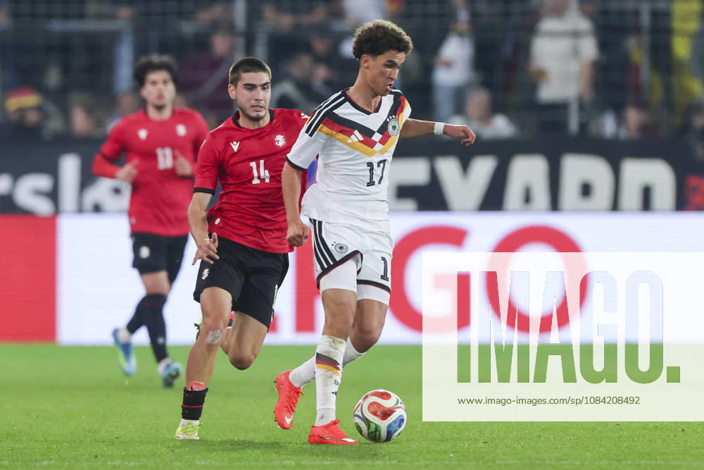 Aleko Basiladze of Georgia and Noah Darvich of Germany battle for the ball during the UEFA Under-21 EURO qualifier between Germany U21 and Georgia U21 at Almstadion on October 6, 2026, in Bielefeld, Germany. Photo by Marco Steinbrenner, DeFodi Images