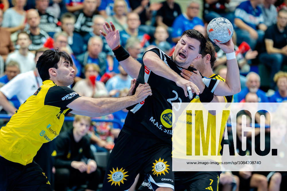 Solingen, October 6, 2026, Handball, Men s, EHF, European League, Group Stage, Matchday 2, 2026–2027, Bergischer HC vs. IK Sävehof, Janik Schrader (Bergischer HC, No. 23) in a one-on-one battle with Tom Poyet (IK Sävehof, No. 7)